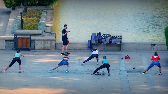 people, exercising, recreation, women, sports, nature, outdoors, pavement, park, instructor, summer, health, street - hormonal health